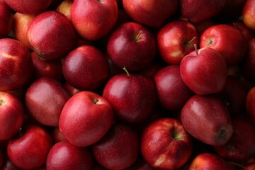 Fresh ripe red apples as background, top view
