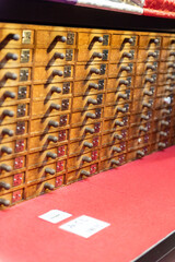 Small wooden drawers containing various fortunes, or Omikuji, at Sensoji temple, Asakusa, Tokyo, Japan