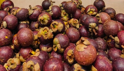 Close up group of fresh mangosteens fruit