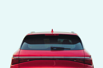Rear view of red SUV car on light background.