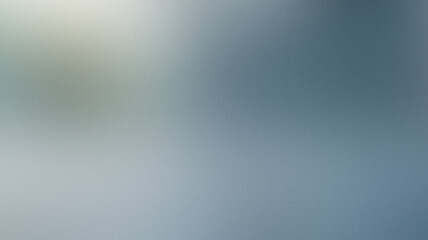Grainy abstract background featuring a soft gradient with noise textures in cool tones for creative use