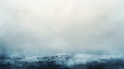 Obraz premium An out-of-focus background with soft gray and blue tones, creating a calming and modern visual