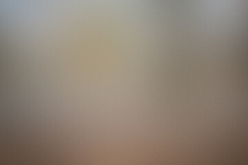 A blurry image of a wall with a brownish tint. Noisy backdrop with grain