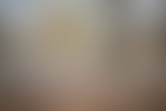 A blurry image of a wall with a brownish tint. Noisy backdrop with grain