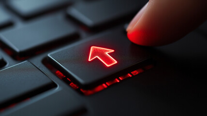 Finger pressing glowing Close up Macro Red Arrow key on a black computer keyboard
