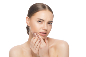 Young woman suffering from toothache, pressing palms to jaw