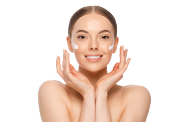 Young happy beautiful smiling woman with drops of cream on cheeks, holding palms close to face