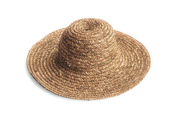 Straw hat on white background. Travel and sun protection items. Woven hat. Traditional handicraft.