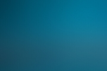 A captivating gradient backdrop with noisy grain textures in shades of blue for creative projects and presentations