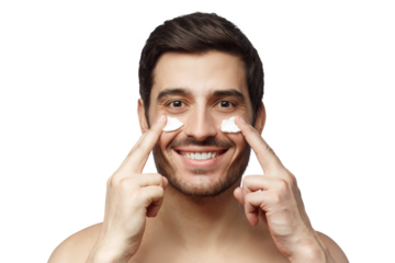 Young handsome man with moisturizer cream on his face. Skin care concept