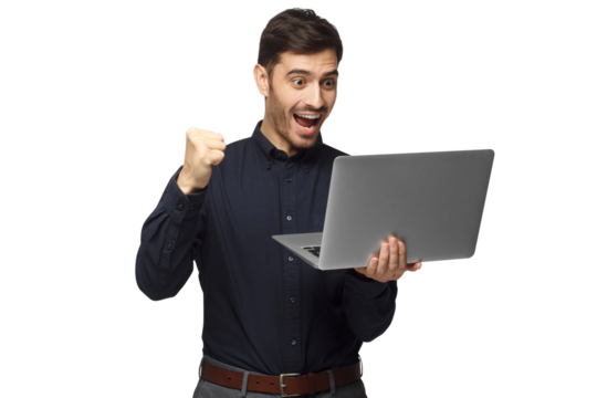 Happy excited sucessful business man holding laptop and raising his arm up to celebrate achievement or win