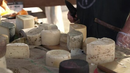 Local Farmer sells farmer's cheese and butter at the market