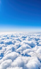 Naklejka premium Breathtaking Aerial View of Fluffy Clouds Against a Blue Sky