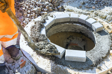At concrete is being laid to anchor blocks completing upper edge of underground infrastructure...