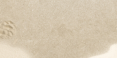 Close-up of a light beige sand texture, ideal as a natural background or surface pattern.