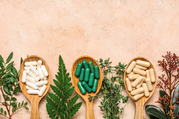 Composition with different pills and fresh herbs on color background, closeup
