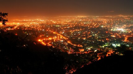 Fototapeta premium Captivating Cityscape Illuminated by the Radiant Glow of Nighttime Lights
