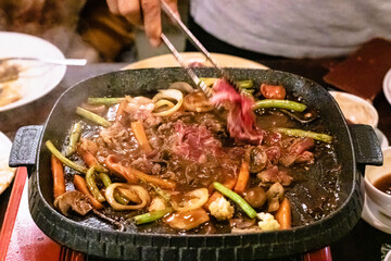 Close up of Beef steak frying in restaurant.