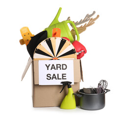 Box of unwanted stuff for garage sale on white background