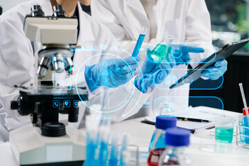 Modern medical research laboratory. female scientist hands working with micro pipettes analyzing...