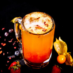 drink of beer whit red fruits