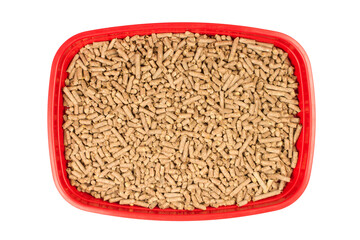 Litter box with granulated cat litter. The pet toilet is isolated on a white background.