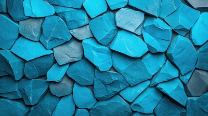 A blue stone wall with a blue and white stone pattern