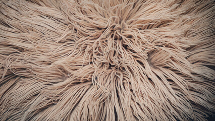 Fototapeta premium a close-up, top down view of a carpet with a soft, plush texture
