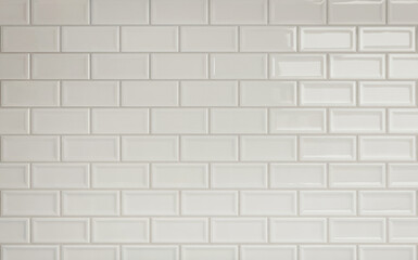 pattern of perfectly square, white tiles with white grout arranged in rows and columns, creating a flawless grid