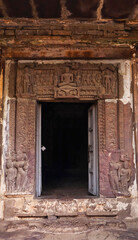 Carved entrance of the Jain Temple adorned with sculptures of deities, located in Budhi Chanderi, Madhya Pradesh, India.