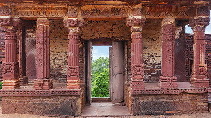 Inside view of the entrance area of the Jain Temples, featuring intricate stonework, located in...