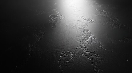 Obraz premium A reflective surface with subtle textures and light variations.