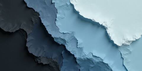 Obraz premium Soft Black Textured Paper in Pale Blue with Layered Textured Shapes Resembling Ice or Clouds