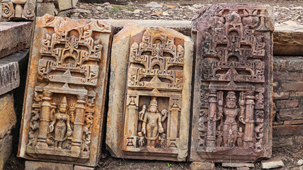 Carvings of Hindu deities on the rear side of the Akhati Group of Temples, located in Kadwaya, Ashoknagar, Madhya Pradesh, India.