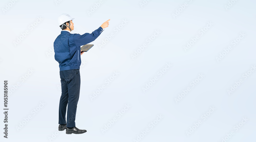 Aufkleber タブレットを持って点検する男性作業員の全身写真（切り抜き背景透過pngも販売しております。作成者リンクから「png」で検索してください）