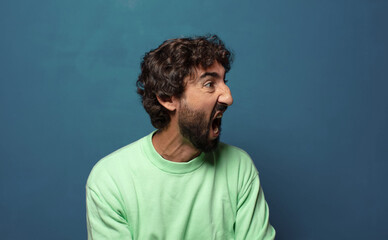 shouting aggressively, looking very angry, frustrated, outraged or annoyed, screaming no