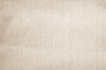 Fototapeta premium Closeup detail of beige fabric texture background. High resolution photo.
