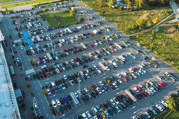 Aerial view of cars parked at shopping center lot © AlexGo