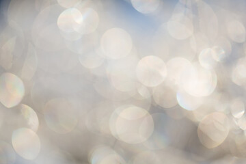 winter nature with snow and ice in blur. blurred background with abstract bokeh gray blue color