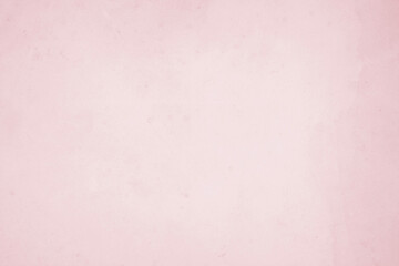 A vintage pink paper texture background with a grunge feel, perfect for art and design projects.