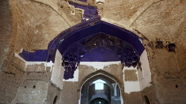 Original tiles on wall in Blue Mosque in Tabriz, Iran. Constructed in 1465 and severely damaged by earthquake in 1780. Masterpiece of Azeri architecture. Historic heritage and tourist attraction.