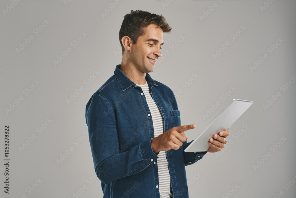 Poster search, smile and tablet with man in studio isolated on gray background for app download or update. 