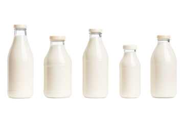 Milk bottles with caps aligned in a row, isolated on white background. Concept of dairy products and freshness.