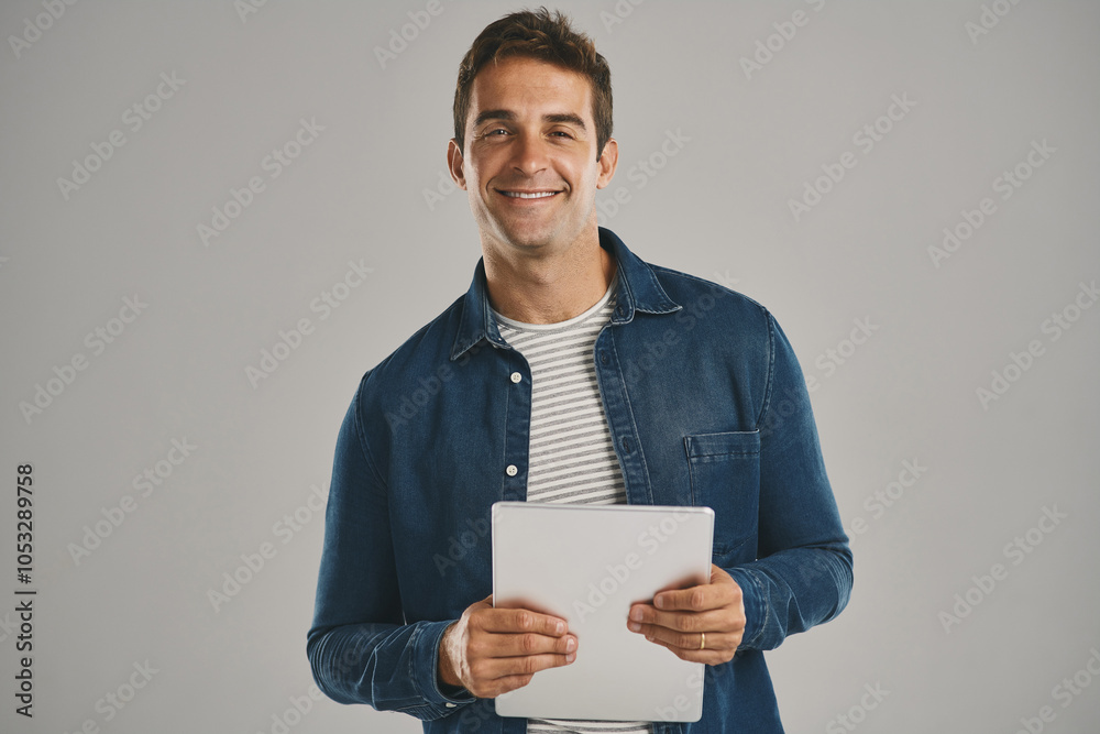 Poster confident, portrait and tablet with man in studio isolated on gray background for app download or up
