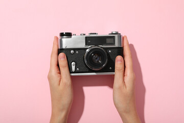 Fototapeta premium Retro camera, photo shooting on retro camera