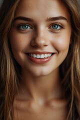 Obraz premium photo of a beautiful girl who smiles, face close up