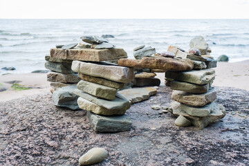 Stack of stones on a beach. Stacking rocks to make dreams come true. Make a wish.