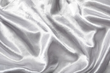 Obraz premium Silver shiny background with satin fabric texture