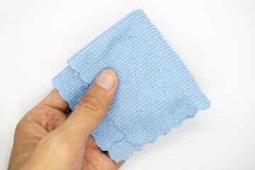 hand holding cleaning cloth isolated on white background