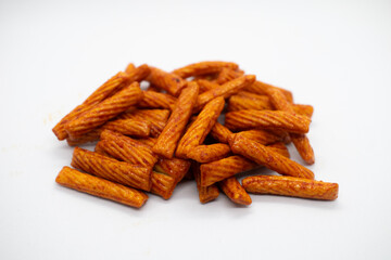 Sweet and spicy stick snack with a crunchy and savory taste